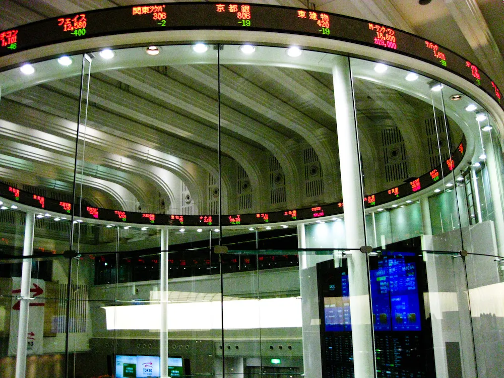 stock market trading floor screens